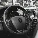 a black and white photo of a car dashboard