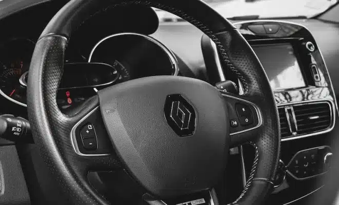 a black and white photo of a car dashboard