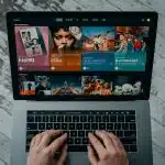 macbook pro on white table